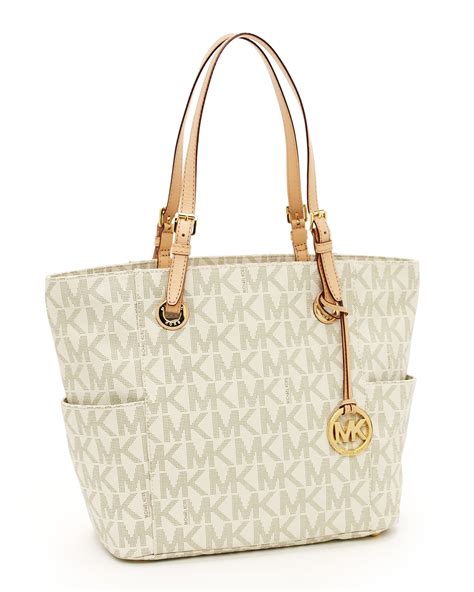 michael kors jet set logo print signature vanilla tote handbag|Michael Kors airplane bag.